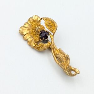 Antique flower design with small amethyst brooch pin